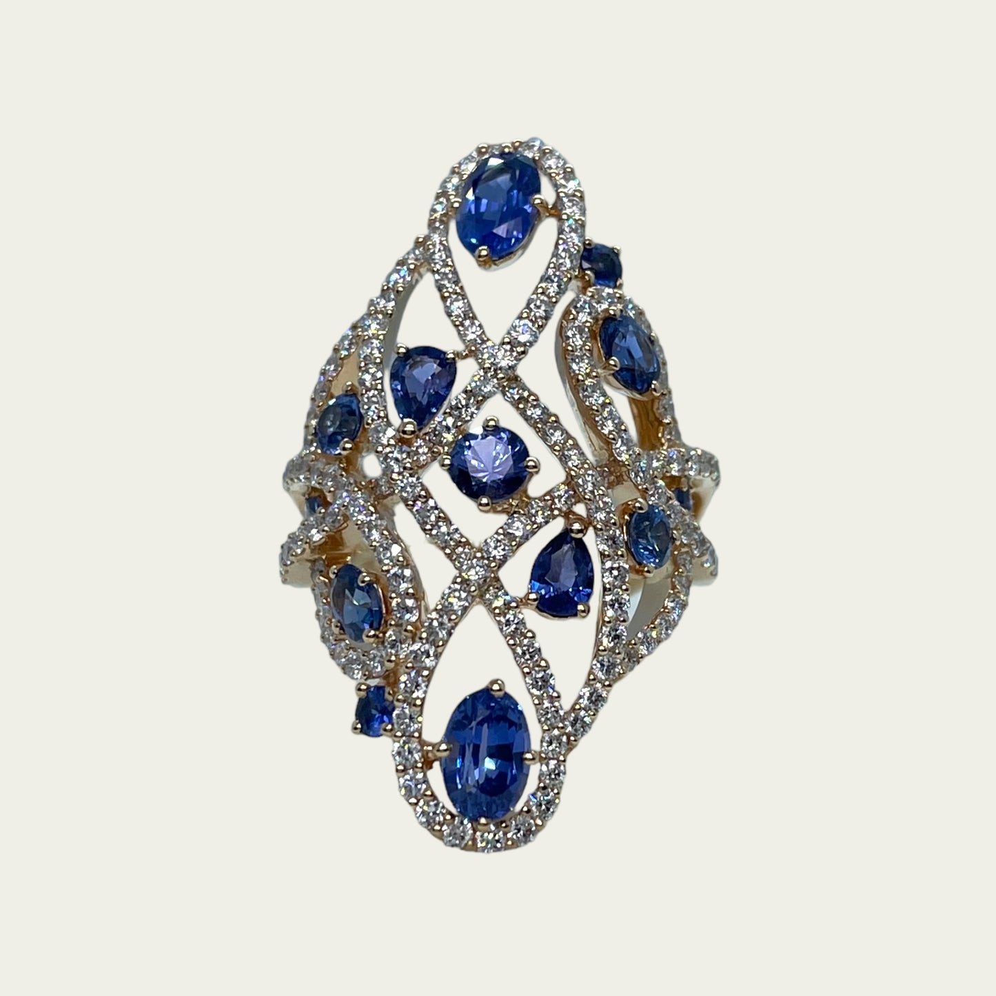 Anello in oro con diamanti e zaffiri Crivelli